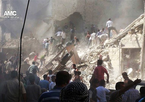 Syrians inspect the rubble of damaged buildings due to heavy shelling by Syrian government forces / AP