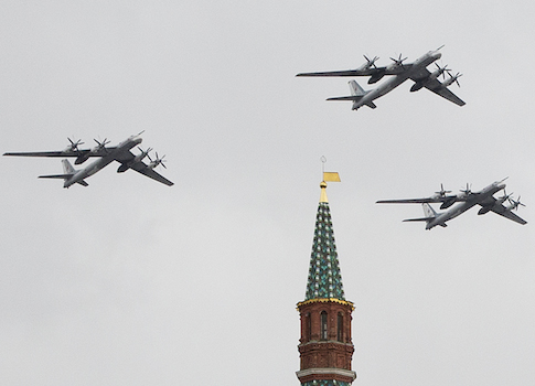 Russia's Air Force strategic bombers, Tu-95, fly over Red Square / AP
