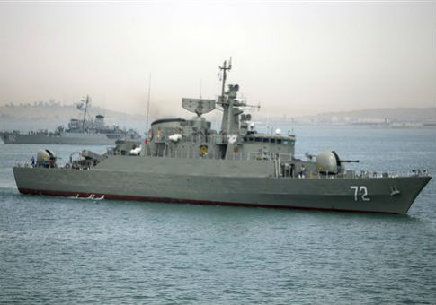 A warship prepares to leave Iranian waters / AP