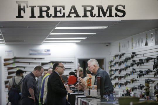 Customers at a California gun shop / AP