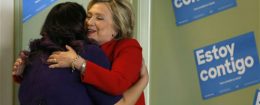 Hillary Clinton, right, hugs immigration activist Astrid Silva / AP