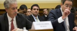 Philippe Reines, senior adviser to Secretary of State Hillary Clinton, center, watches Benghazi hearing on Dec. 20, 2012 / AP