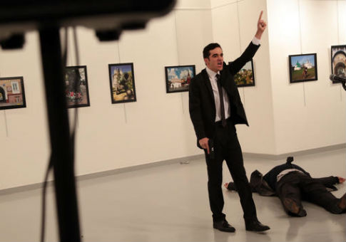 Mevlut Mert Altintasat after shooting Russian Ambassador to Turkey Andrey Karlov in Ankara, Dec. 19, 2016 / AP