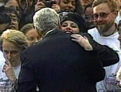 In this image taken from video, Monica Lewinsky embraces President Clinton as he greeted well-wishers at a White House lawn party in Washington Nov. 6, 1996