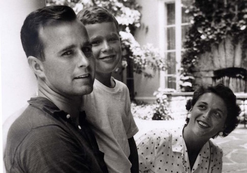 George W. Bush is shown with his father, George Bush and mother, Barbara Bush in Rye, New York, in this file photo taken during the summer of 1955
