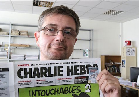 AP's cropped photo of Charlie Hebdo editor Stephane Charbonnier