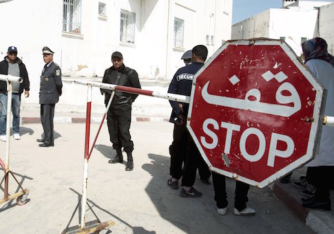 People are pictured near the morgue in Tunis March 19, 2015