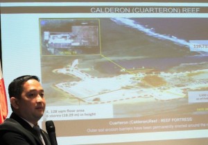 Francisco Acedillo, a lawmaker and a former air force pilot, shows a slide of China's reclamation work in the Spratly as he called for a creative strategy to deal with the maritime territorial dispute during a Foreign Correspondent of the Philippines (FOCAP) meeting in Manila March 26, 2015