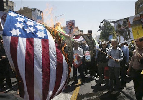 Iranian demonstrators burn a representation of the U.S. flag in an annual pro-Palestinian rally marking Al-Quds (Jerusalem) Day