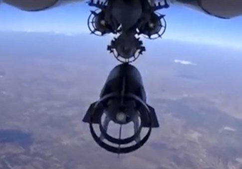 A bomb is released from a Russian fighter jet