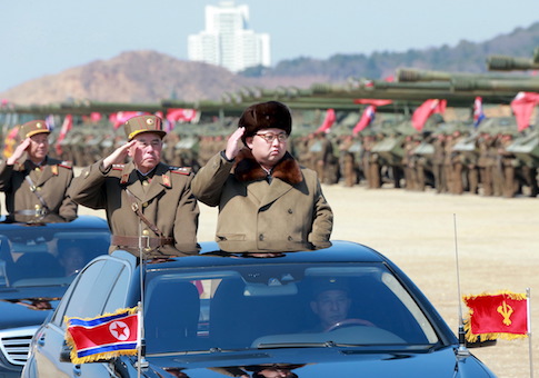 North Korean leader Kim Jong Un salutes as he arrives to inspect a military drill at an unknown location, in this undated photo released by North Korea's Korean Central News Agency (KCNA)