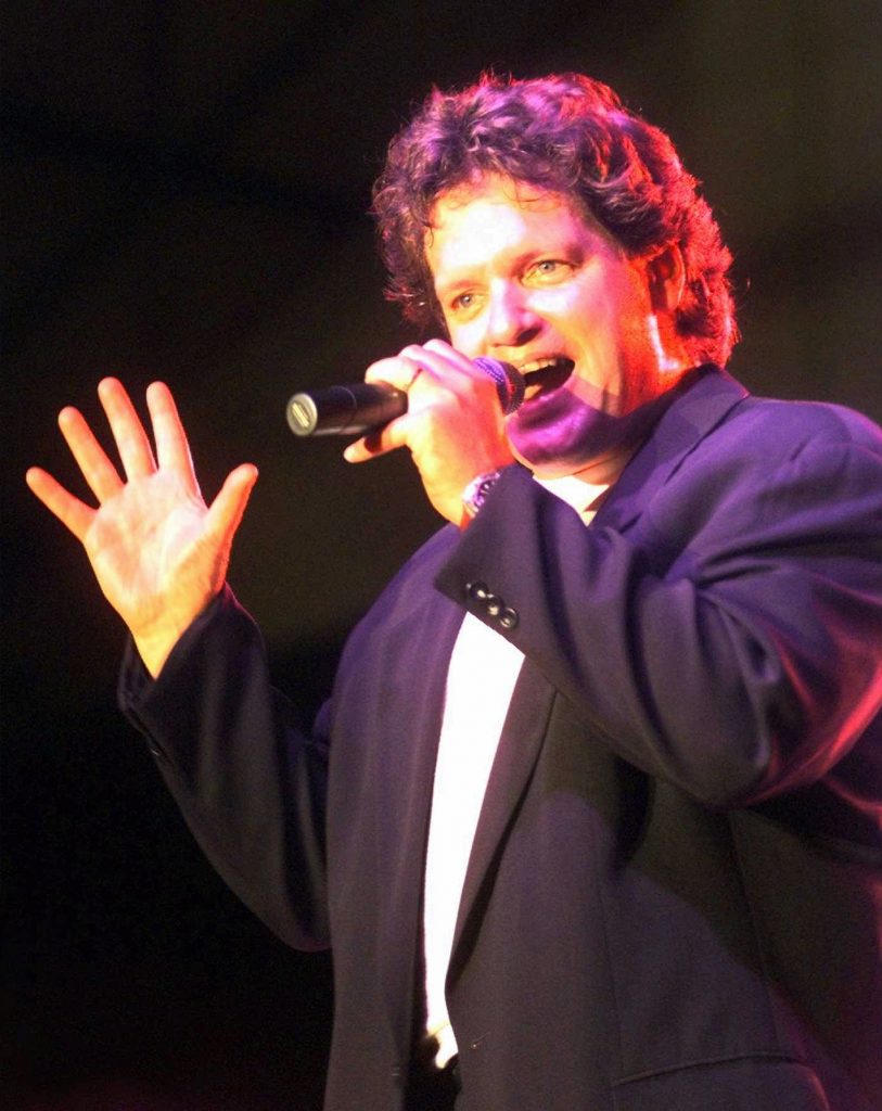 Roger Clinton, brother of President Clinton, sings with his band at the San Mateo Fair in San Mateo on Monday, Aug. 11, 1997 in San Mateo, Calif. (AP Photo/Susan Ragan)