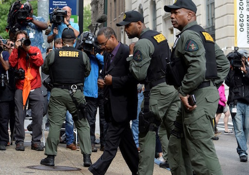 Officer Caesar Goodson arrives at the courthouse in Baltimore