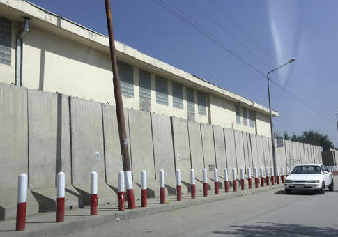 A car passes American Unversity of Afghanistan in Kabul / AP