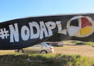 A banner protesting the Dakota Access oil pipeline is displayed at an encampment near North Dakota's Standing Rock Sioux reservation