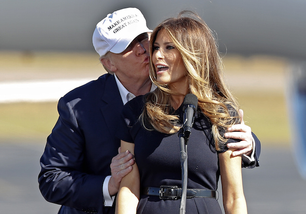Republican presidential candidate Donald Trump kisses his wife Melania as she introduces him at a campaign rally Saturday, Nov. 5, 2016, in Wilmington, N.C. (AP Photo/John Bazemore)