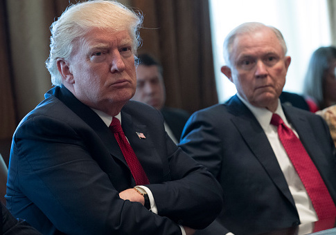 Donald Trump (L) and Attorney General Jeff Sessions (R) attend a panel discussion on an opioid and drug abuse in the Roosevelt Room of the White House March 29, 2017 in Washington, DC. / Getty Images