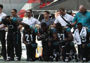Jacksonville Jaguar players protest on Sept. 24, 2017 in London, England / Getty Images