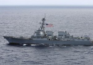USS Chafee, a US Navy destroyer which operates 100 percent on biofuel, sails about 150 miles north of the island of Oahu during the RIMPAC Naval exercises off Hawaii