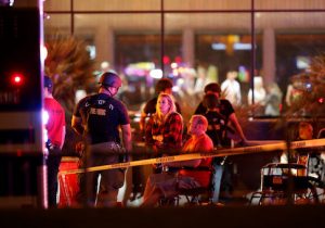 People wait in a medical staging area on October 2, 2017, after a mass shooting during a music festival in Las Vegas
