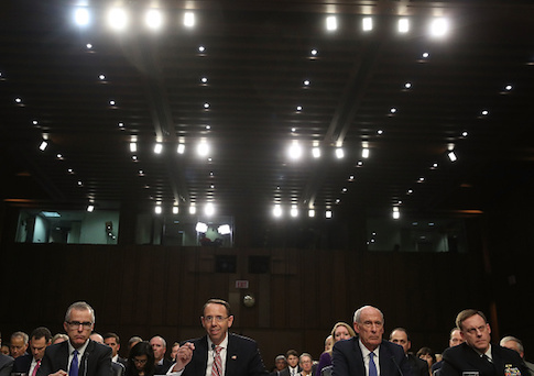 Acting FBI Director Andrew McCabe, Deputy Attorney General Rod Rosenstein, Director of National Intelligence Dan Coats, and National Security Agency Director Adm. Michael Rogers appear before the Senate Intelligence Committee