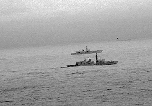 Images from an infrared camera on a helicopter show Royal Navy frigate HMS St Albans escorting Russian warship Admiral Gorshkov as it passes close to UK territorial waters
