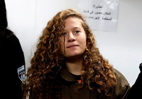Sixteen-year-old Ahed Tamimi stands for a hearing in the military court at Ofer military prison in the West Bank village of Betunia