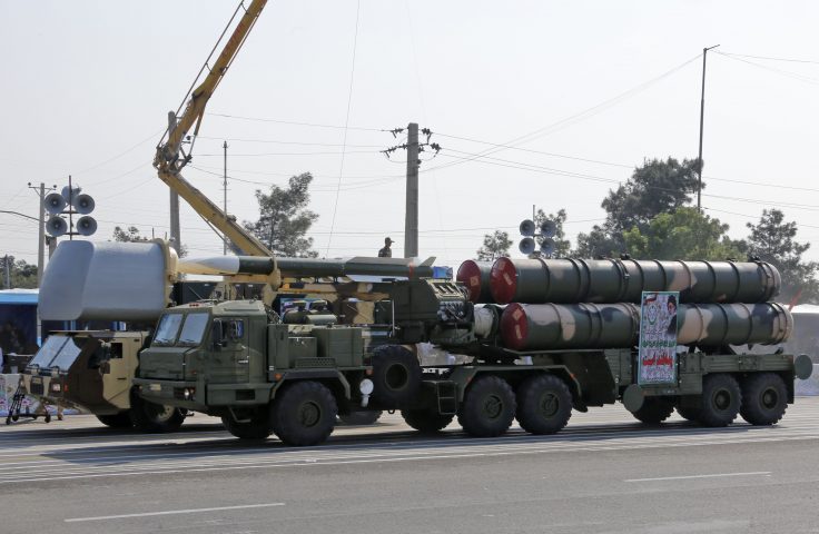 An Iranian military truck carries parts of a S-300 air defense missile system during a parade