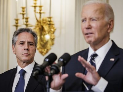 Secretary of State Antony Blinken stands alongside President Joe Biden /